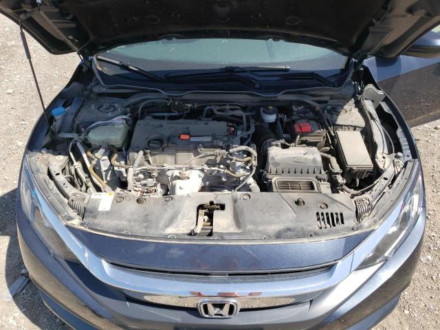 Photo 7 from auction – 2018 HONDA CIVIC LX with VIN 19XFC2F55JE007356
