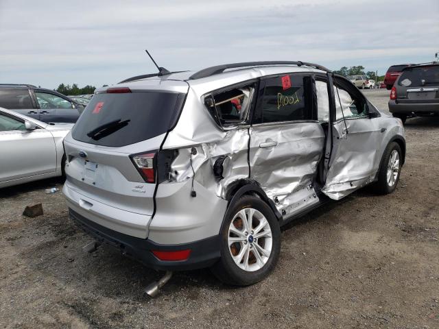 Photo 4 from auction – 2018 FORD ESCAPE SE with VIN 1FMCU0GD7JUA76203