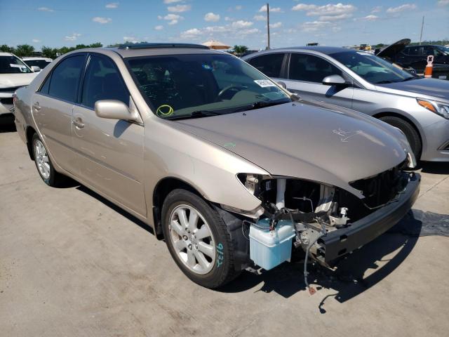 TOYOTA CAMRY LE 2004 with VIN 4T1BE32K64U930120 - Photo from auction