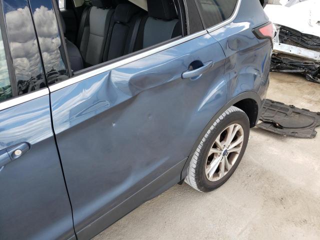 Photo 9 from auction – 2018 FORD ESCAPE SE with VIN 1FMCU0GD4JUB15412