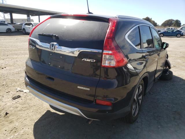 Photo 4 from auction – 2016 HONDA CR-V TOURI with VIN 5J6RM4H97GL039113