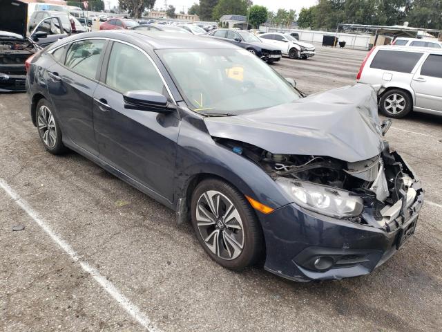 HONDA CIVIC EX 2018 with VIN 2HGFC1F30JH643472 - Photo from auction