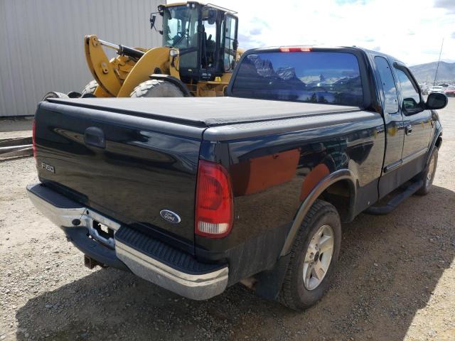 Photo 4 from auction – 2002 FORD F150 with VIN 1FTRX18W32NB02027