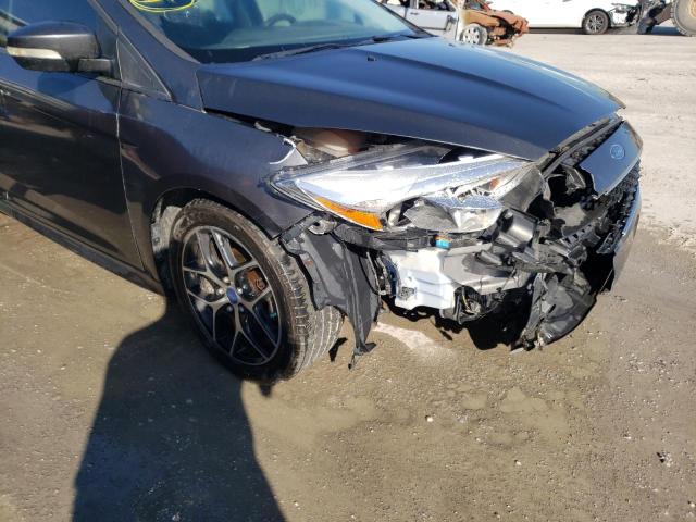 Photo 9 from auction – 2015 FORD FOCUS SE with VIN 1FADP3F28FL374151