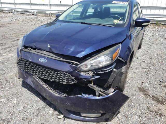 Photo 9 from auction – 2016 FORD FOCUS SE with VIN 1FADP3F29GL307611