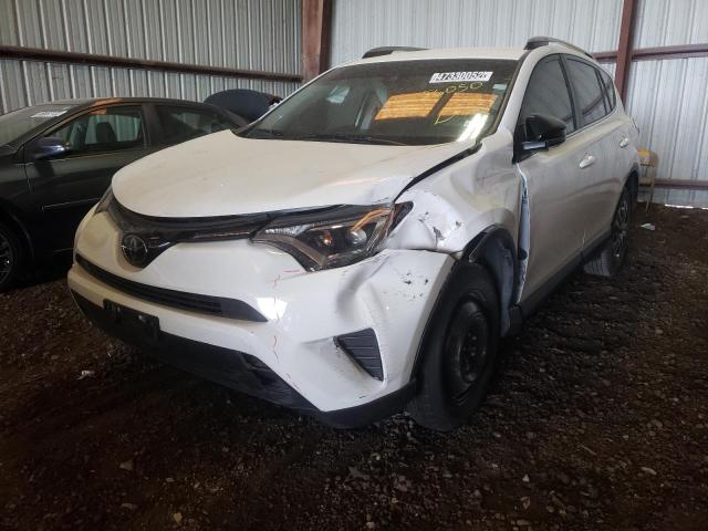 Photo 2 from auction – 2018 TOYOTA RAV4 LE with VIN JTMZFREV2JJ169253