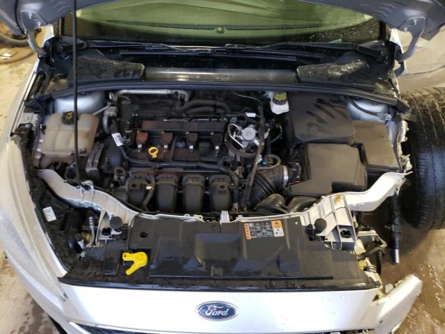Foto 7 de la subasta – 2018 FORD FOCUS SE con VIN 1FADP3F22JL292733