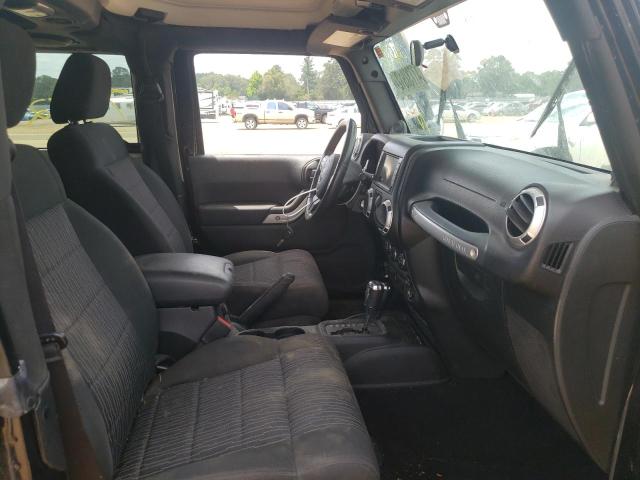 Photo 5 from auction – 2011 JEEP WRANGLER R with VIN 1J4BA6D16BL574075