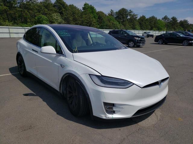 TESLA MODEL X 2018 with VIN 5YJXCDE27JF109632 - Photo from auction