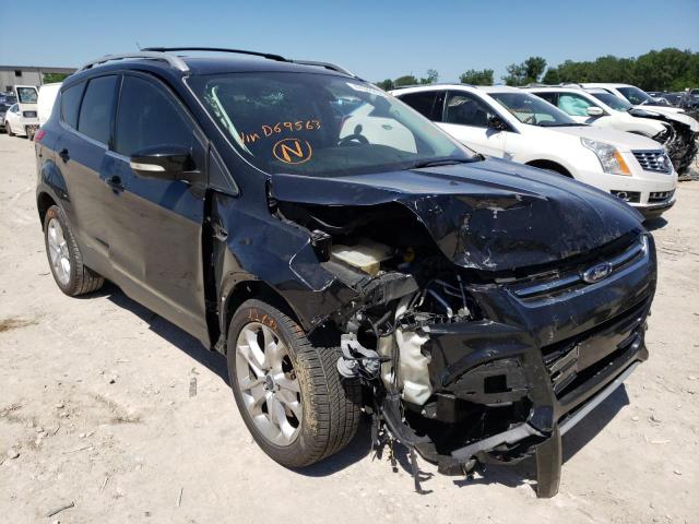 FORD ESCAPE 2014 with VIN 1FMCU9JX5EUD69563 - Photo from auction