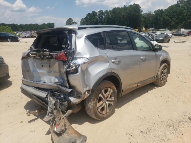 Photo 4 from auction – 2018 TOYOTA RAV4 LE with VIN JTMZFREV0JJ187797