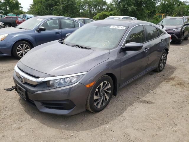 Photo 2 from auction – 2018 HONDA CIVIC EX with VIN 2HGFC2F70JH523230