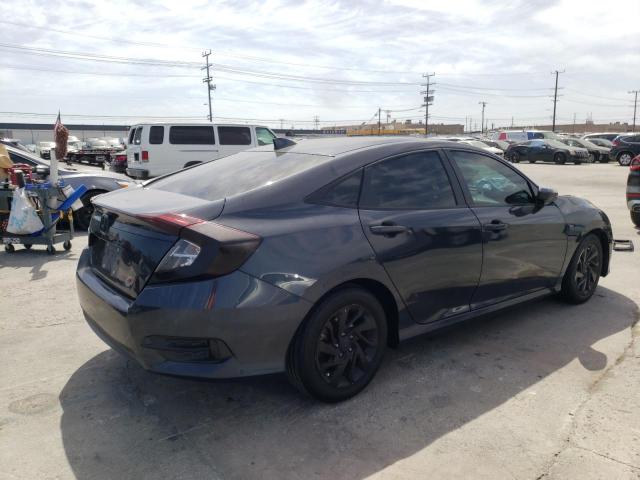 Photo 4 from auction – 2018 HONDA CIVIC EX with VIN 2HGFC2F76JH590463