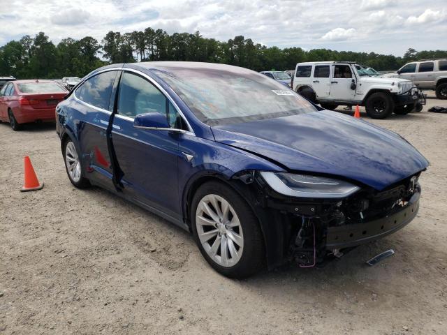 TESLA MODEL X 2020 with VIN 5YJXCBE26LF302975 - Photo from auction