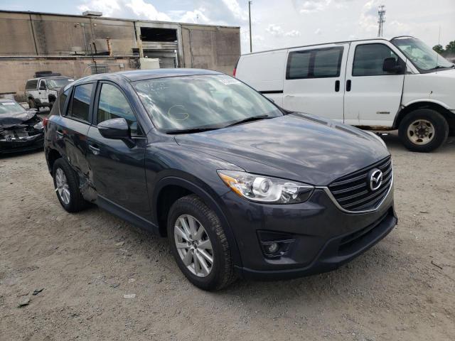 MAZDA CX-5 TOURI 2016 with VIN JM3KE2CY5G0607830 - Photo from auction