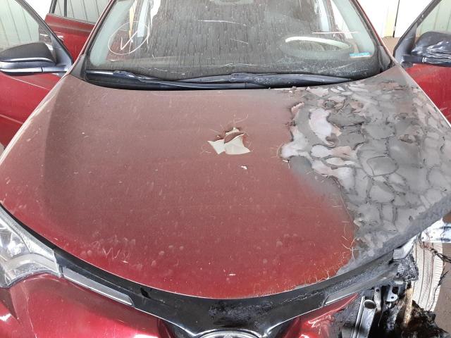 Photo 7 from auction – 2018 TOYOTA RAV4 LE with VIN 2T3ZFREV0JW429974