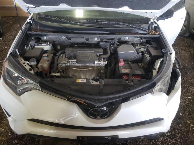 Photo 7 from auction – 2018 TOYOTA RAV4 LE with VIN JTMZFREV2JJ169253