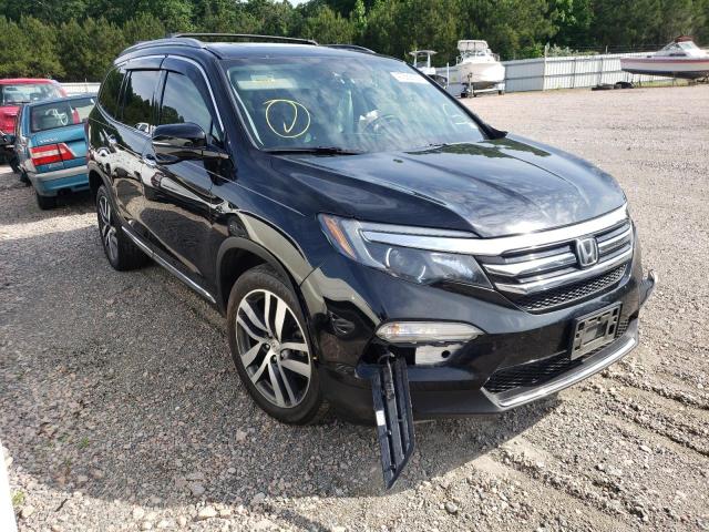 HONDA PILOT TOUR 2017 with VIN 5FNYF6H94HB097546 - Photo from auction
