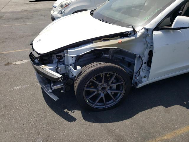 Photo 9 from auction – 2021 TESLA MODEL 3 with VIN 5YJ3E1EA7MF940308