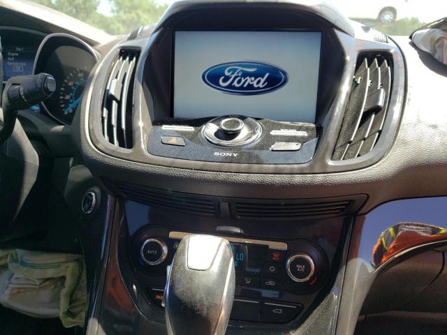 Photo 9 from auction – 2014 FORD ESCAPE with VIN 1FMCU9JX5EUD69563