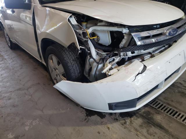 Photo 9 from auction – 2009 FORD FOCUS S with VIN 1FAHP34N09W263790
