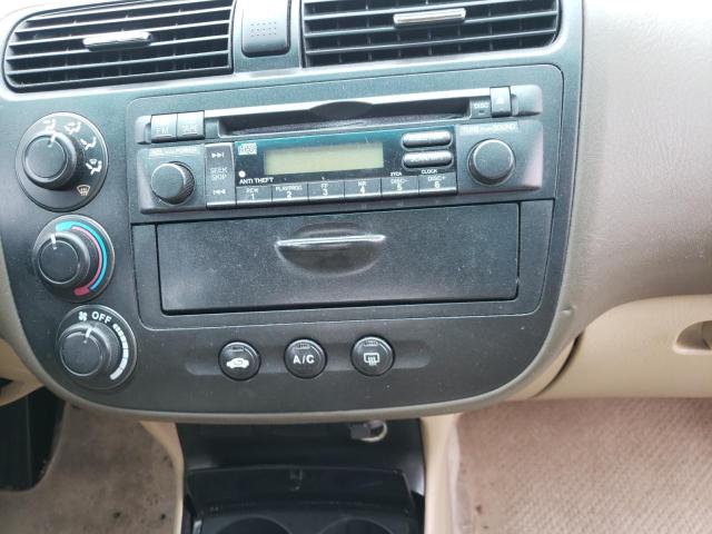 Photo 9 from auction – 2004 HONDA CIVIC LX with VIN 2HGES16574H517064