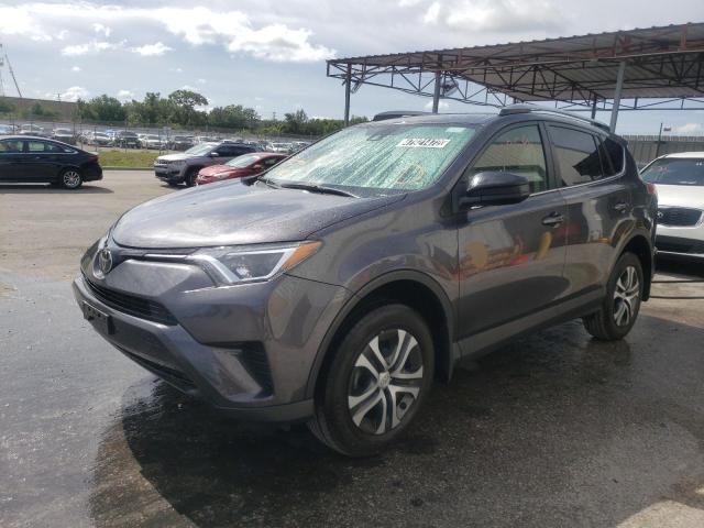 Photo 2 from auction – 2018 TOYOTA RAV4 LE with VIN JTMBFREV9JJ747172