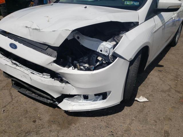 Photo 9 from auction – 2016 FORD FOCUS SE with VIN 1FADP3K27GL232381