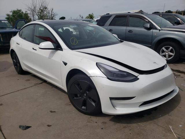TESLA MODEL 3 2021 with VIN 5YJ3E1EA0MF976874 - Photo from auction