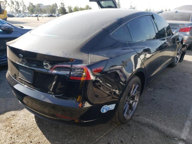 Photo 4 from auction – 2021 TESLA MODEL 3 with VIN 5YJ3E1EA3MF022507