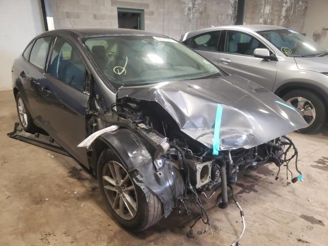 FORD FOCUS SE 2018 with VIN 1FADP3F2XJL208061 - Photo from auction
