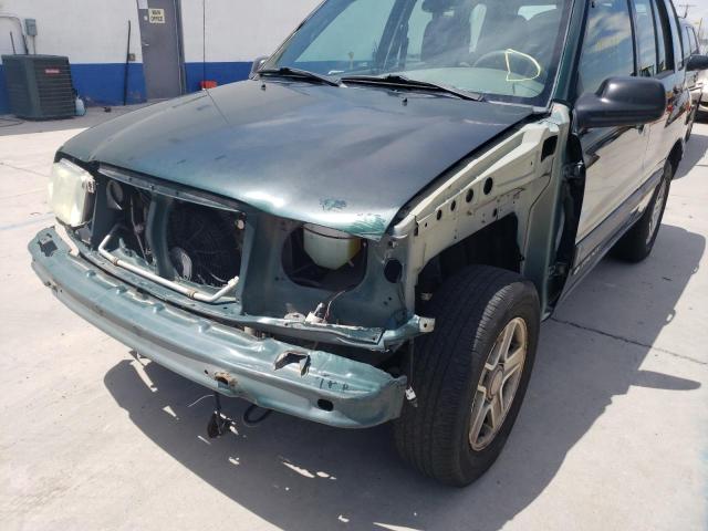 Photo 9 from auction – 2003 CHEVROLET TRACKER with VIN 2CNBJ13CX36948933