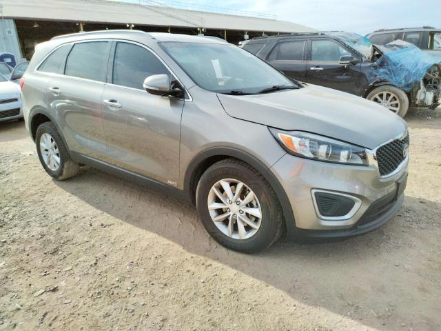 KIA SORENTO LX 2016 with VIN 5XYPGDA33GG136797 - Photo from auction