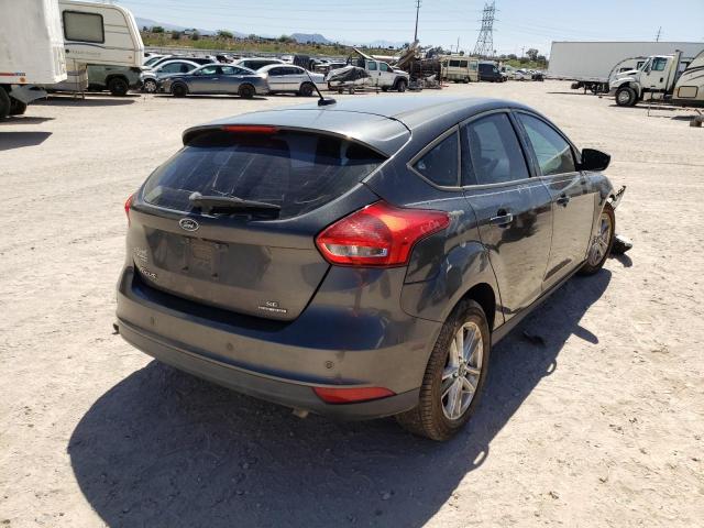 Photo 4 from auction – 2016 FORD FOCUS SE with VIN 1FADP3K28GL324938