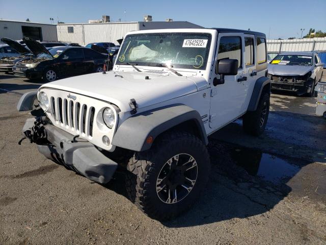 Photo 2 from auction – 2014 JEEP WRANGLER U with VIN 1C4BJWDG4EL178709