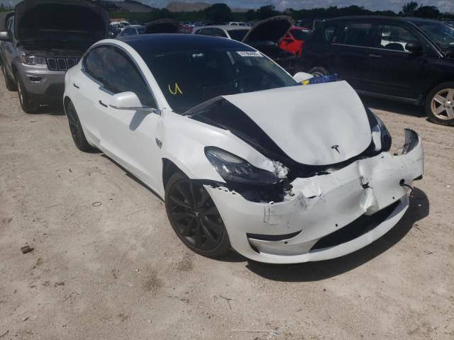 TESLA MODEL 3 2018 with VIN 5YJ3E1EA9JF049030 - Photo from auction