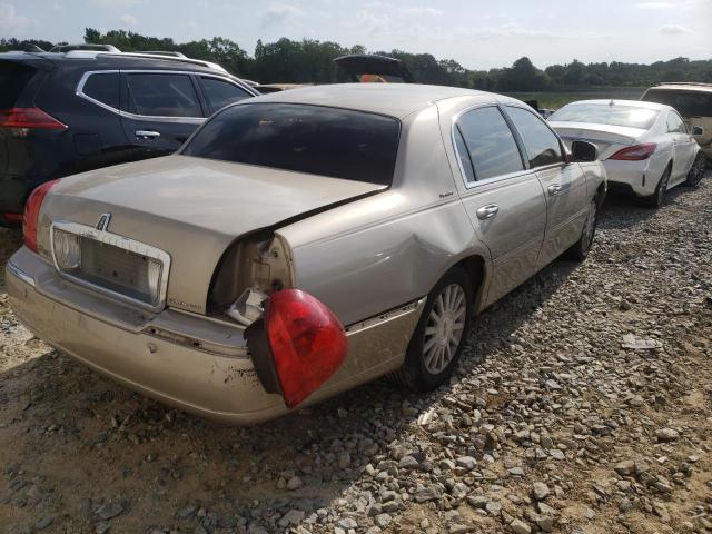 Photo 4 from auction – 2004 LINCOLN TOWN CAR E with VIN 1LNHM81W64Y652794