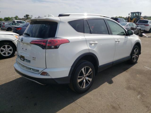 Photo 4 from auction – 2017 TOYOTA RAV4 XLE with VIN JTMRFREV9HJ700877