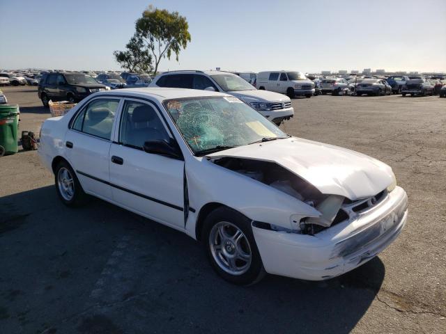 TOYOTA COROLLA VE 2000 with VIN 1NXBR12E8YZ330322 - Photo from auction