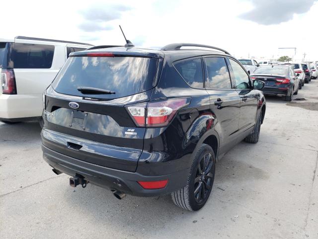 Photo 4 from auction – 2018 FORD ESCAPE SE with VIN 1FMCU9GD8JUB10847