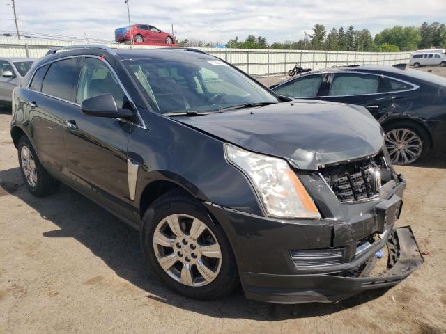 CADILLAC SRX LUXURY 2014 with VIN 3GYFNEE32ES677878 - Photo from auction