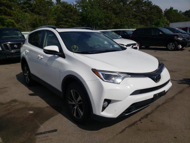 TOYOTA RAV4 XLE 2017 with VIN JTMRFREV9HJ700877 - Photo from auction