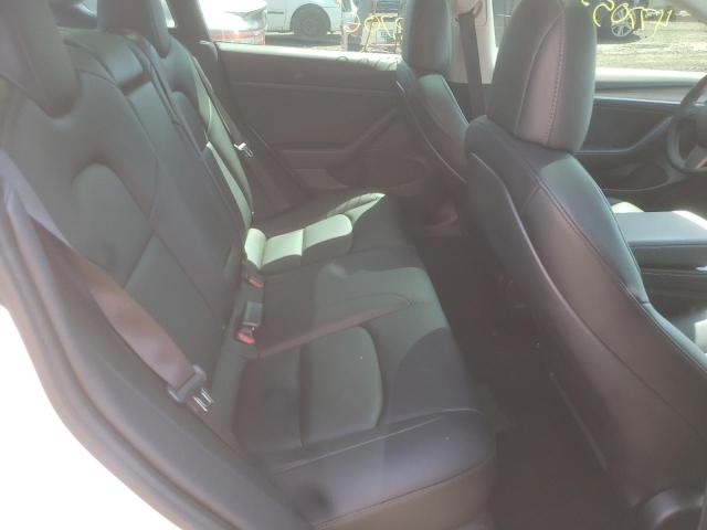 Photo 6 from auction – 2021 TESLA MODEL 3 with VIN 5YJ3E1EAXMF976820