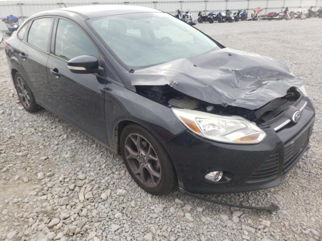 FORD FOCUS SE 2014 with VIN 1FADP3F29EL154841 - Photo from auction