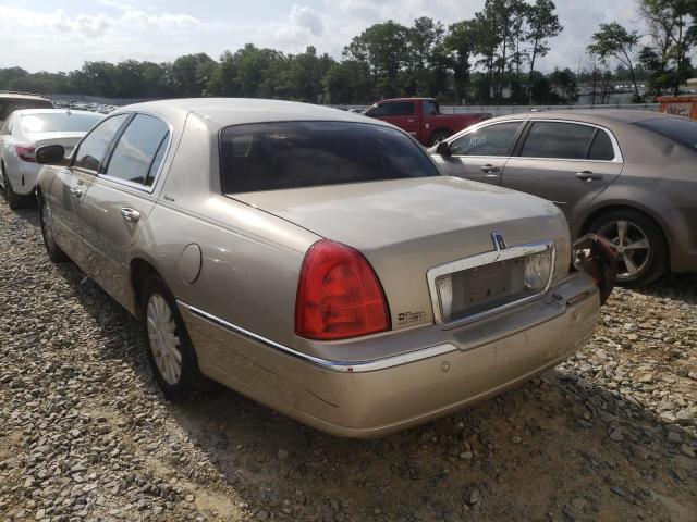 Photo 3 from auction – 2004 LINCOLN TOWN CAR E with VIN 1LNHM81W64Y652794