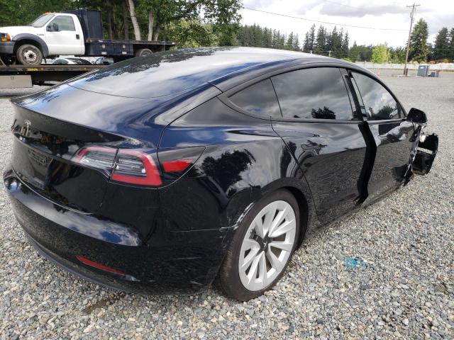 Photo 4 from auction – 2021 TESLA MODEL 3 with VIN 5YJ3E1EA9MF995990