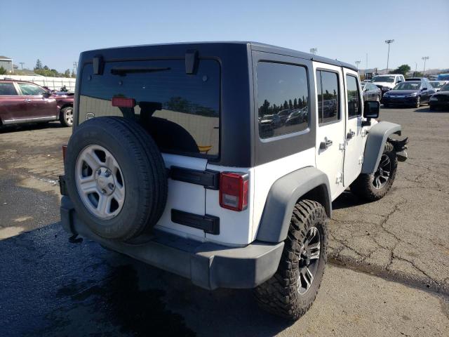 Photo 4 from auction – 2014 JEEP WRANGLER U with VIN 1C4BJWDG4EL178709
