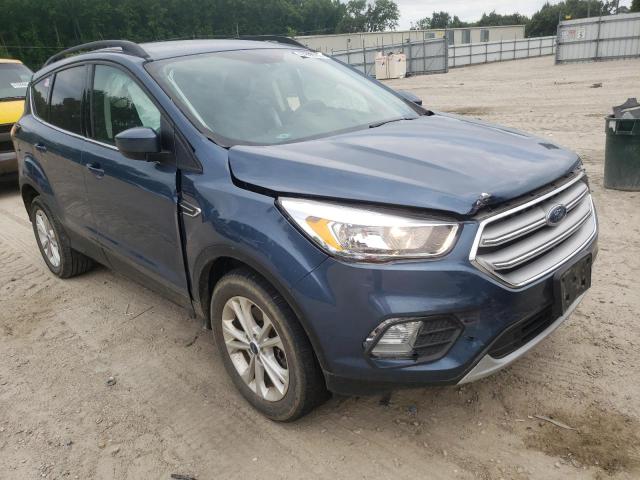 FORD ESCAPE SE 2018 with VIN 1FMCU9GD0JUC28052 - Photo from auction
