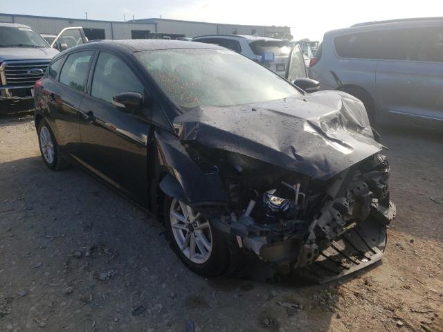 FORD FOCUS SE 2017 with VIN 1FADP3K26HL216979 - Photo from auction