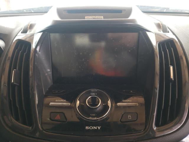 Photo 9 from auction – 2015 FORD ESCAPE TIT with VIN 1FMCU0J92FUA64410